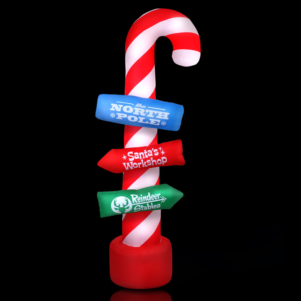 Inflatable red-and-white candy cane pole decoration with lit sign panels and red base.
