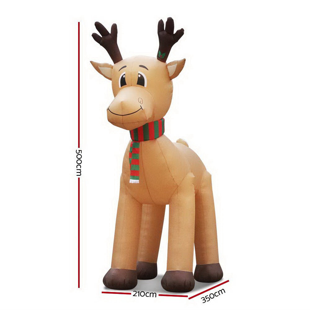 Inflatable reindeer decoration with striped scarf, full-body side view, tan body and dark hooves