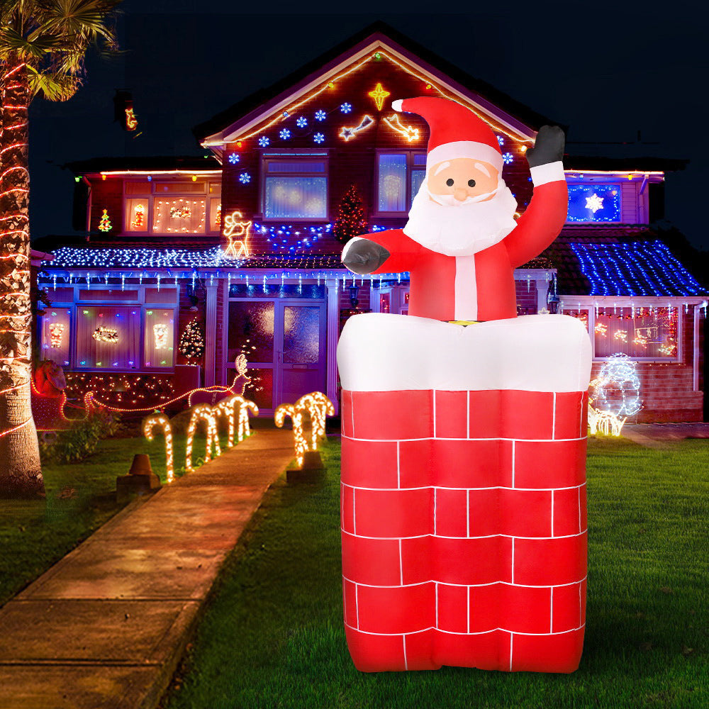 Inflatable Santa pop-up decoration glowing with LED lights, red suit and white beard