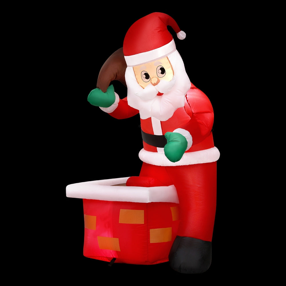 Inflatable Santa yard decoration with red suit, white beard, green gloves, and gift sack