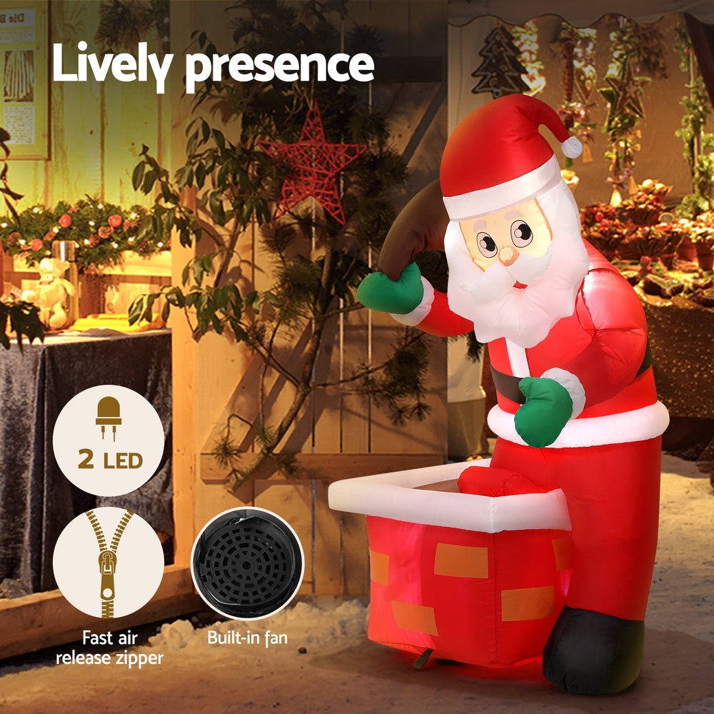 Inflatable Santa yard decoration with glowing LED lights, red suit, white beard, and gift box