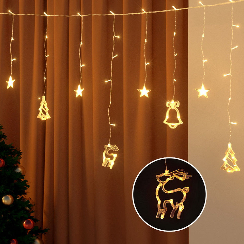 Warm white icicle string lights with star, bell, tree and reindeer hanging charms