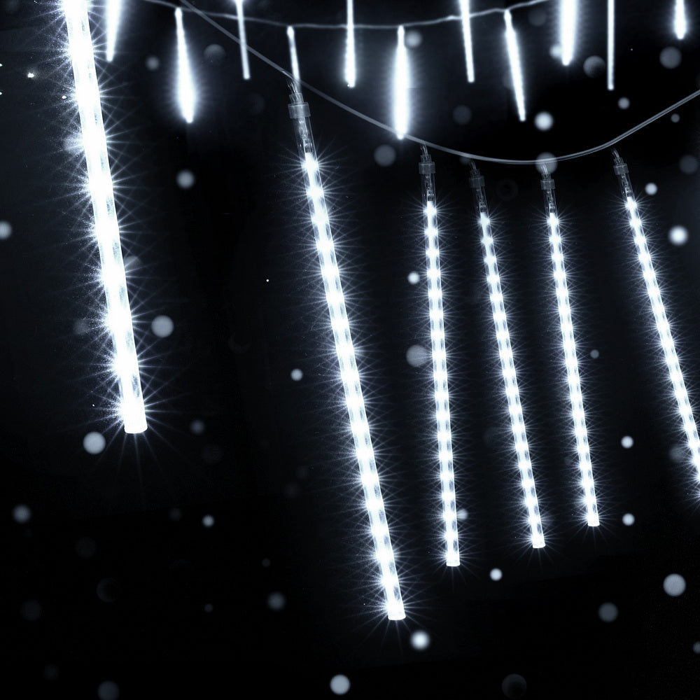 Jingle Jollys icicle LED shower light strands, bright white vertical hanging lights