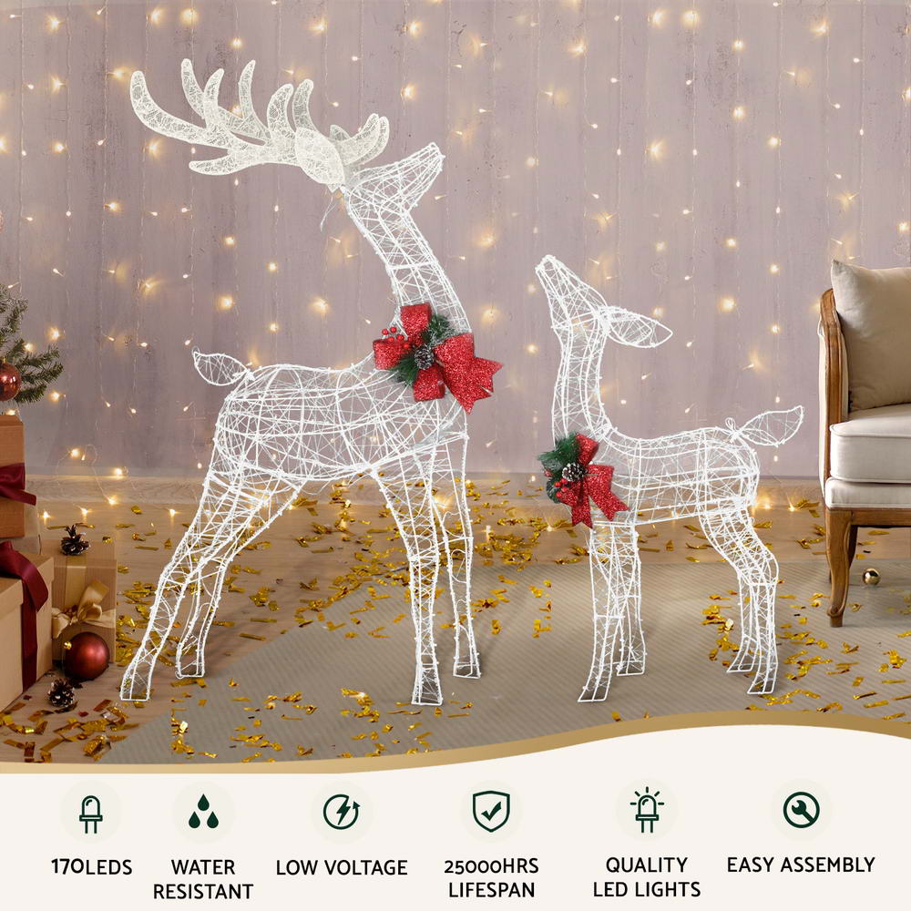 Warm LED reindeer light decorations, two wire figures with red bow accents