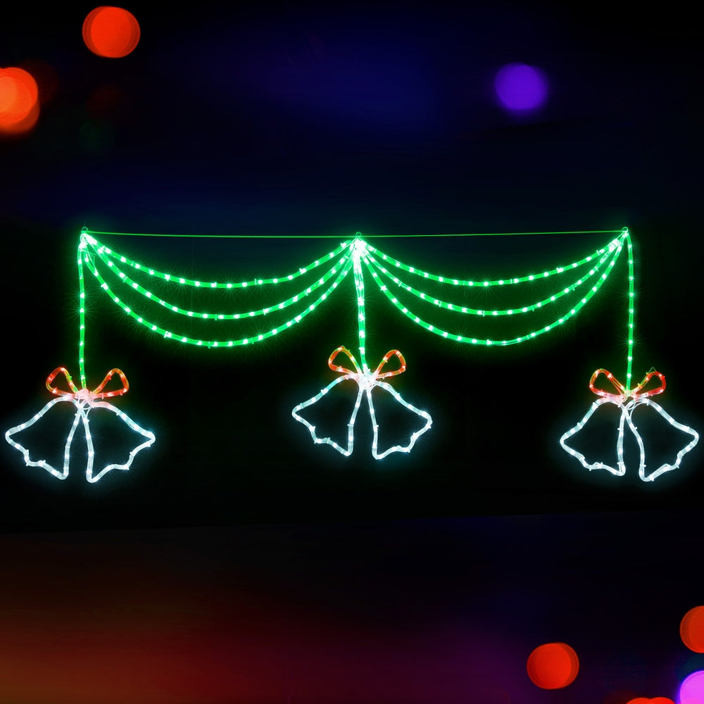 Christmas light curtain with 3 glowing bell bow motifs, green LEDs and orange bow accents