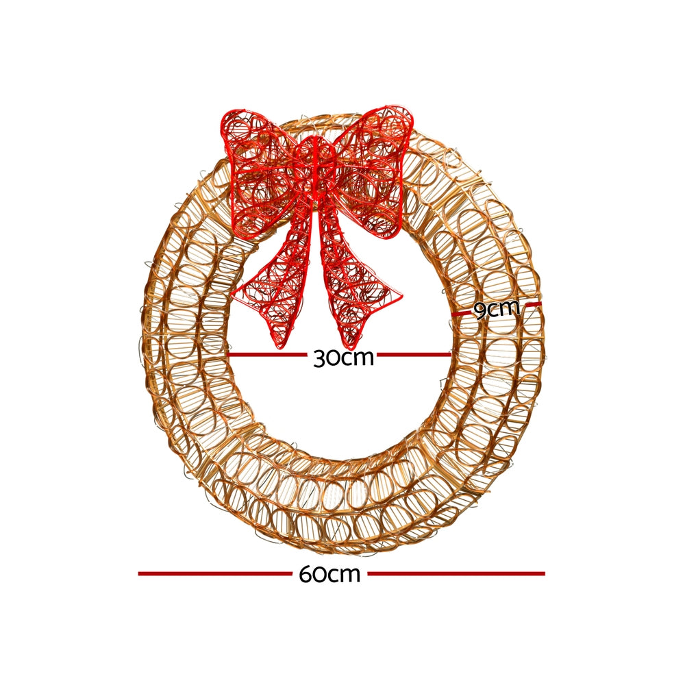 Solar LED wreath with gold wire ring and red bow; 60cm diameter, 30cm inner