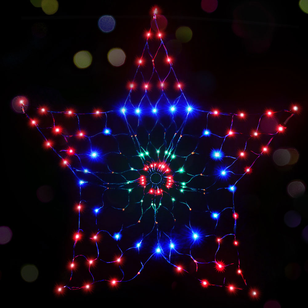 Glowing snowflake light motif with multicolor LEDs in a web-like pattern