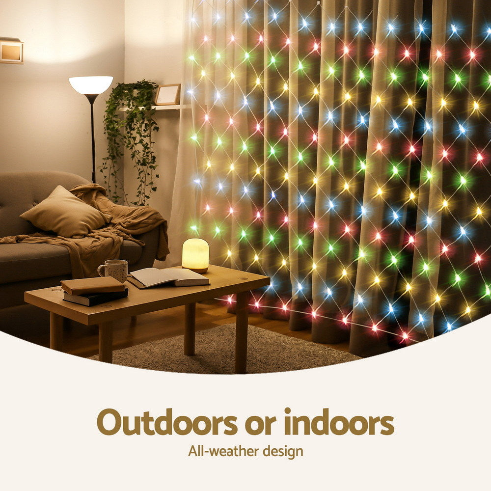 Multicolor LED net string lights curtain with glowing bulbs indoors