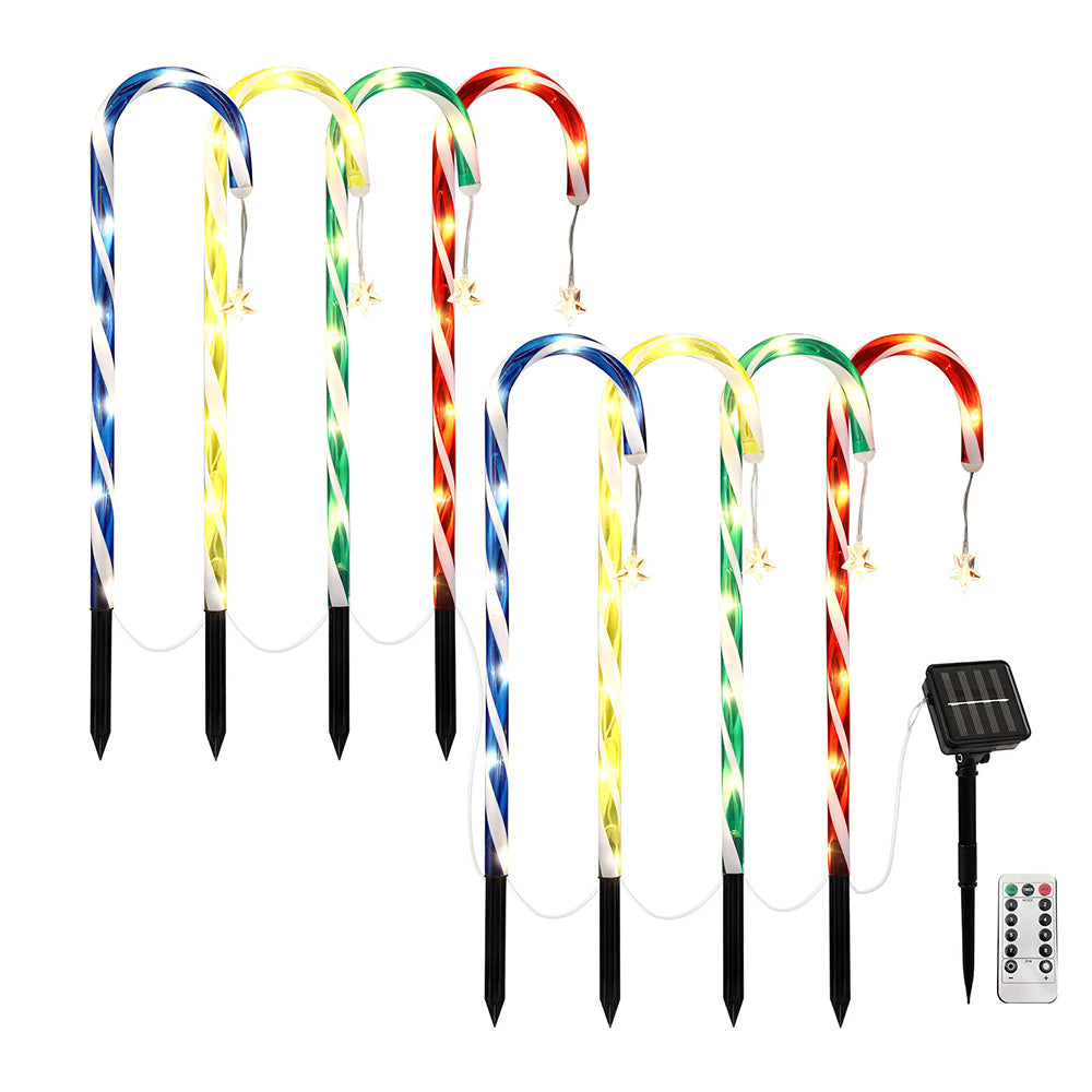 Set of 8 ground solar path lights with multicolor LED tubes, spike stakes, and remote