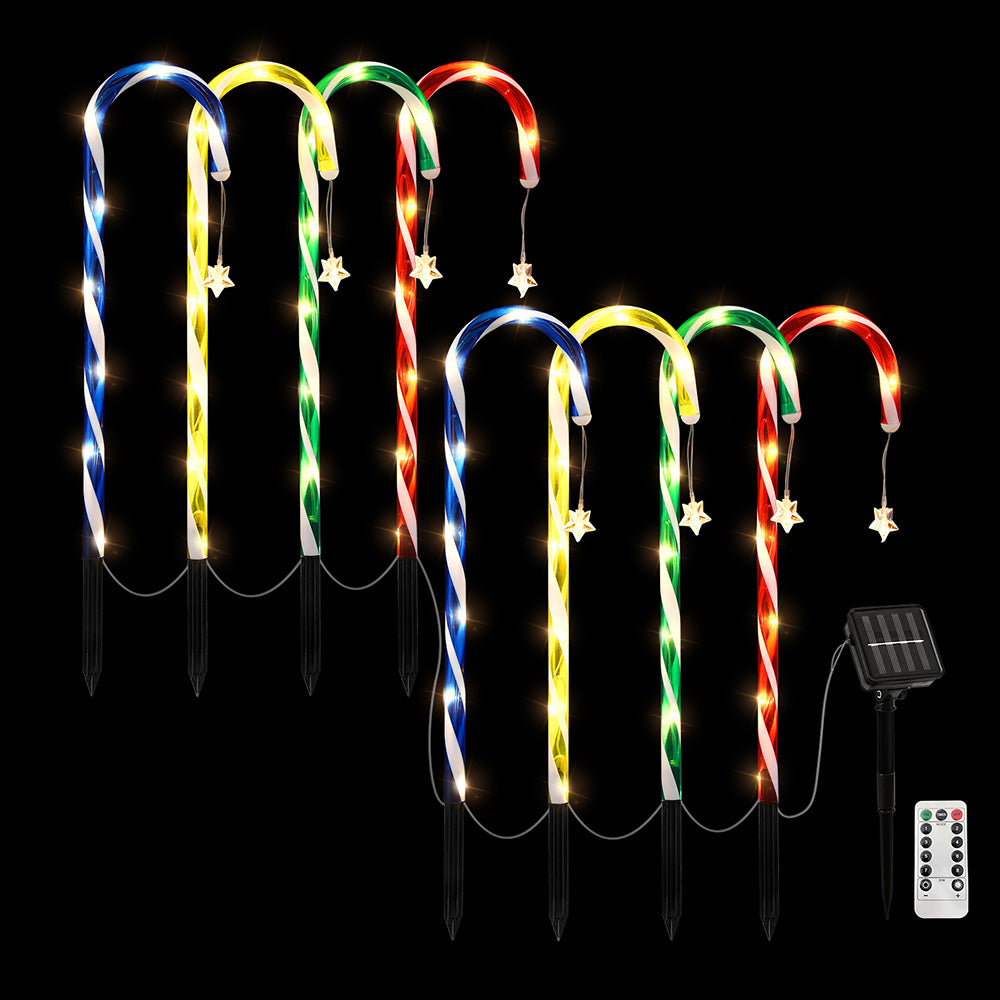 Eight multicolor glowing solar path lights with spiral LED tubes, spike stakes, solar panel, remote