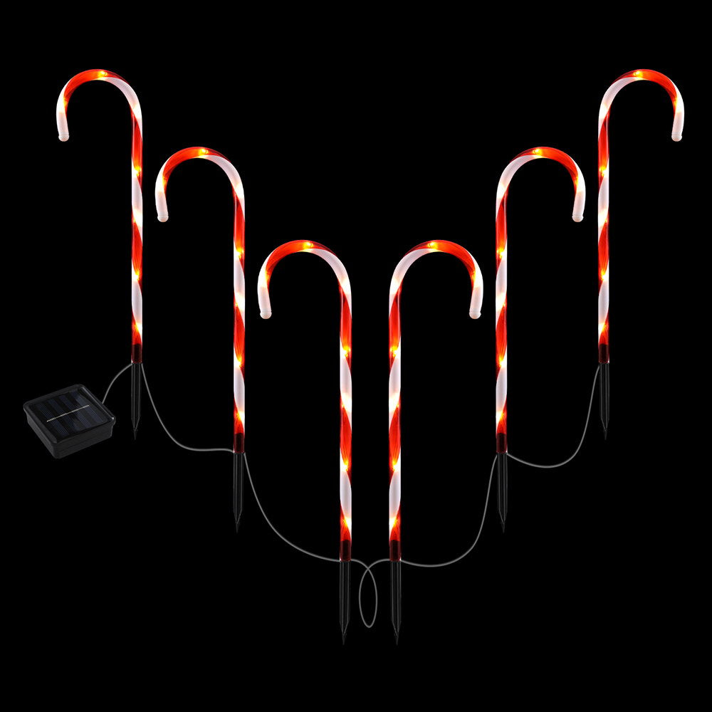 Set of 6 solar ground lights with red-and-white candy-cane LED spikes and solar panel