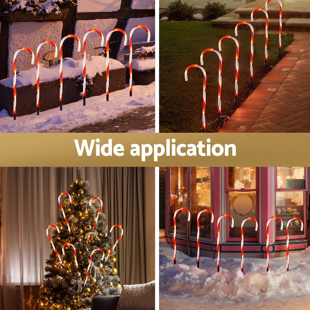 Set of 6 candy-cane LED ground lights with red-and-white striped arches