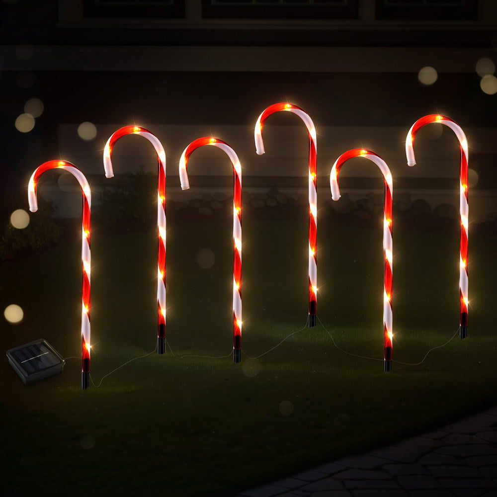 Set of 6 illuminated candy-cane LED ground stakes with solar panel, red and white