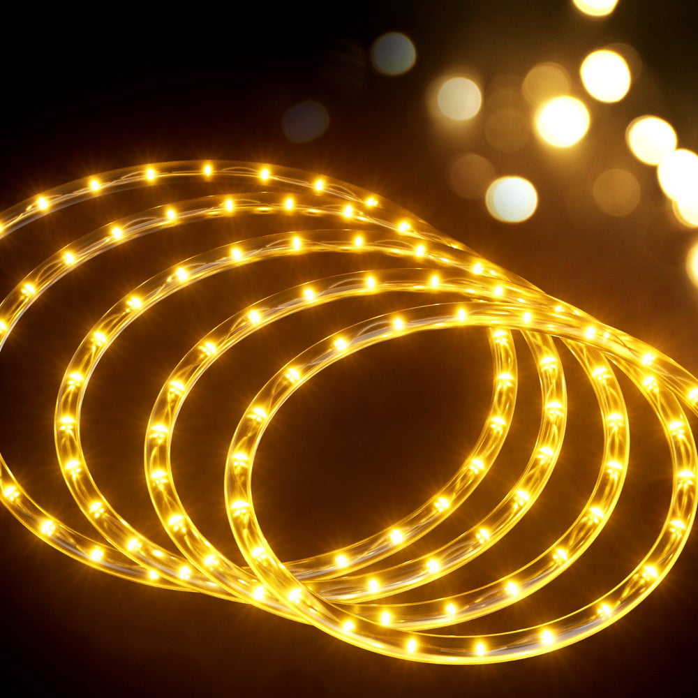 Warm white LED rope light string arranged in curved, glowing loops