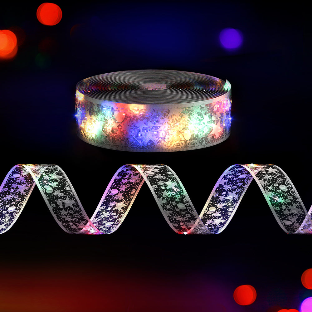 Multicolor LED fairy light ribbon roll with glowing wavy strip and colored lights