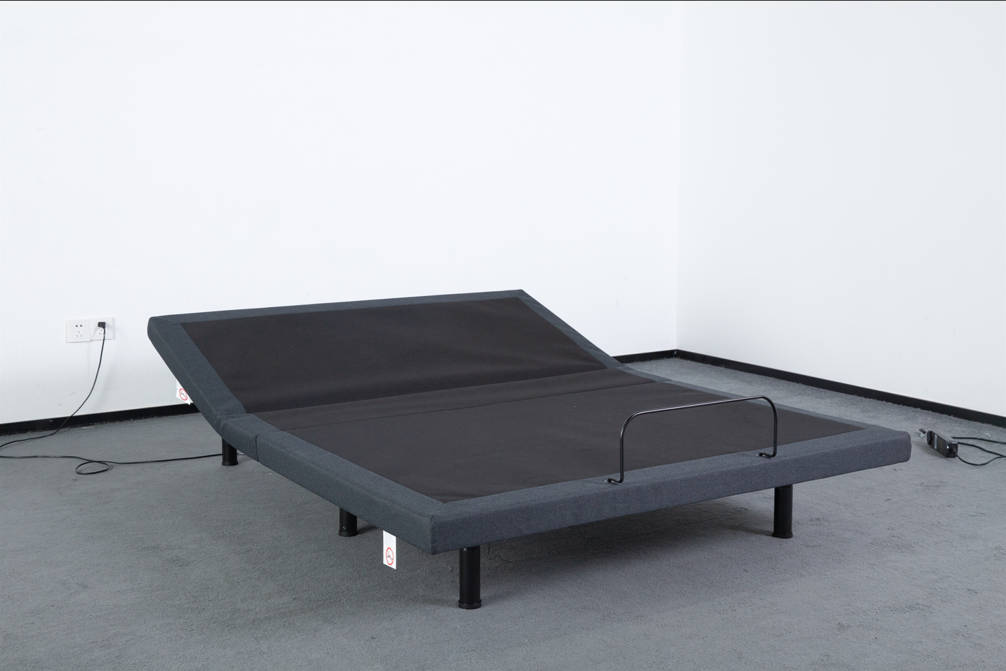 Dual-motor adjustable bed base shown flat with slimline 90mm frame